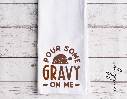 Funny Thanksgiving towel with 'Pour Some Gravy on Me' text and turkey graphic, perfect for holiday kitchen decor.