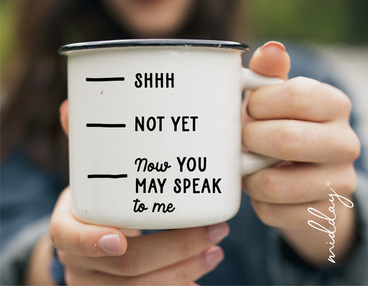Person holding a white coffee mug with text "Shhh, Not Yet, Now You May Speak to Me," humorous coffee quote design.