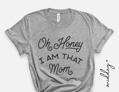 Gray t-shirt with 'Oh Honey I Am That Mom' text, ideal for mom life, Cricut and Silhouette projects, featuring stylish font design.