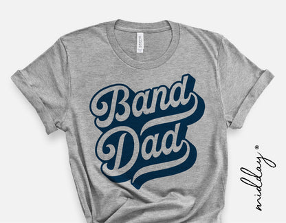 Gray T-shirt with blue 'Band Dad' design, ideal for marching band enthusiasts. Perfect for school spirit wear and Cricut projects.
