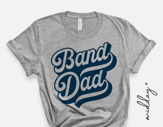 Gray T-shirt with blue 'Band Dad' design, ideal for marching band enthusiasts. Perfect for school spirit wear and Cricut projects.