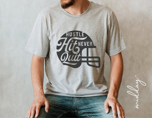 Gray T-shirt with 'Hustle Hit Never Quit' football helmet design