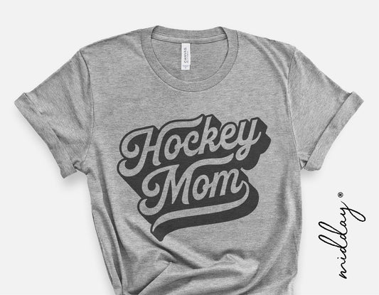 Gray t-shirt with 'Hockey Mom' design, perfect for sports enthusiasts, featuring bold typography for Cricut and Silhouette projects.