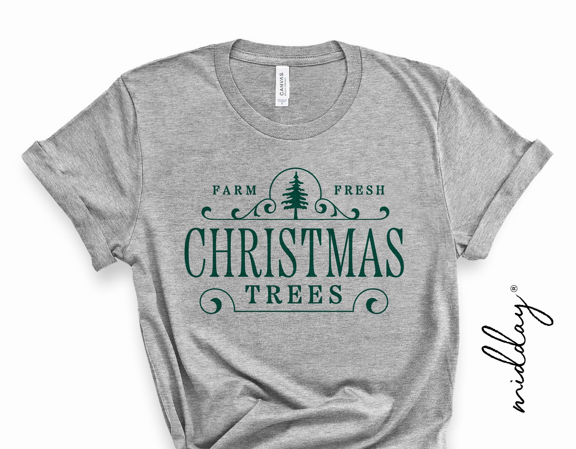 Gray t-shirt featuring green 'Farm Fresh Christmas Trees' graphic, ideal for holiday decor and crafting with Cricut or Silhouette machines.