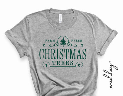Gray t-shirt featuring green 'Farm Fresh Christmas Trees' graphic, ideal for holiday decor and crafting with Cricut or Silhouette machines.