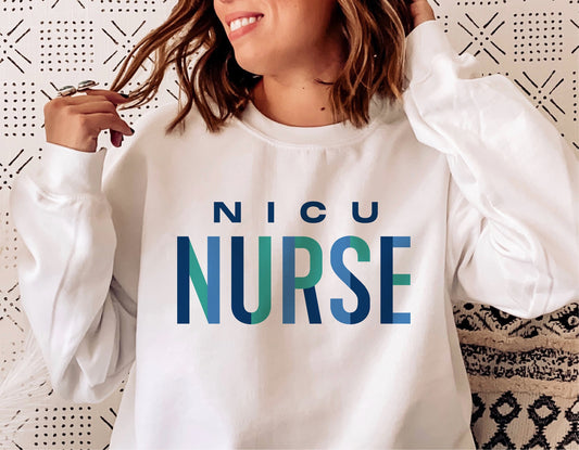 NICU Nurse sweatshirt with stylish text design worn by a woman, perfect for neonatal nurse SVG projects and cut files for Cricut.