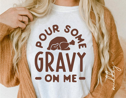 Woman wearing funny Thanksgiving shirt with 'Pour Some Gravy On Me' design, fall fashion SVG cut file for Cricut and Silhouette.