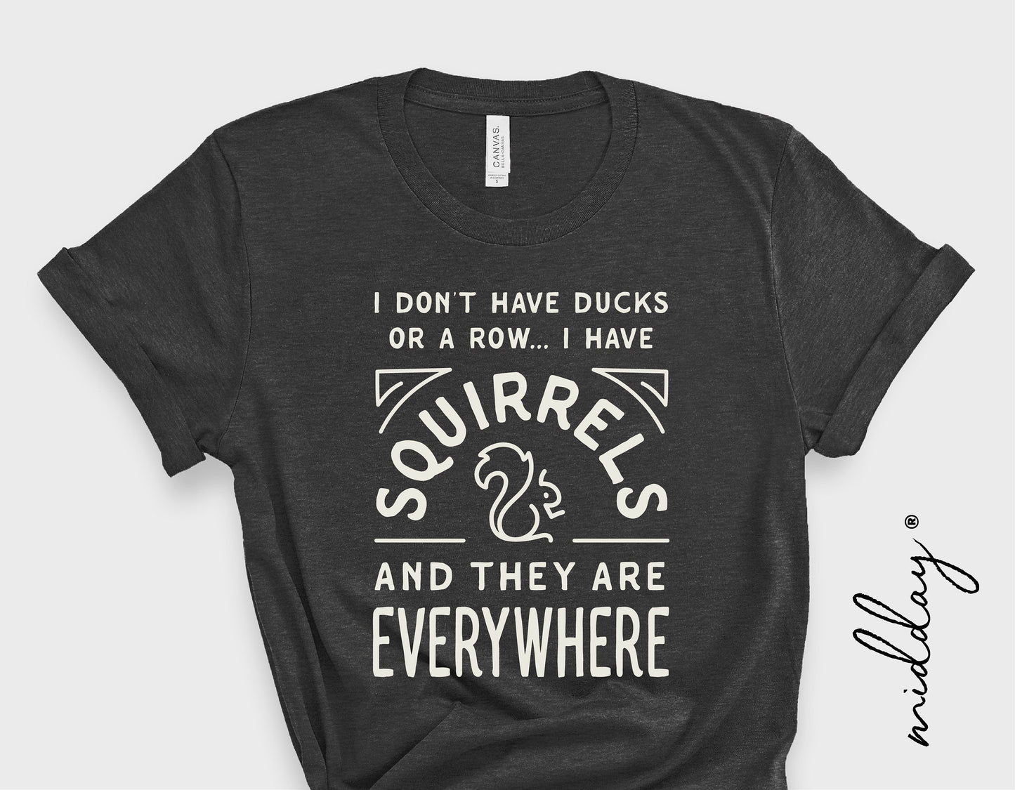 Funny black t-shirt with "I Have Squirrels Everywhere" text and graphic design, perfect for humorous apparel lovers, available in digital file.