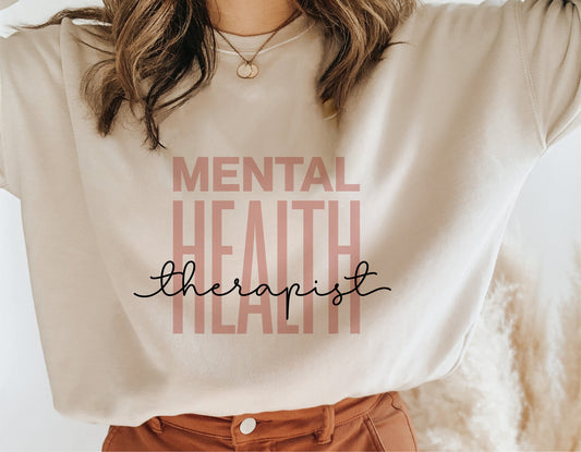 Person wearing a beige shirt with 'Mental Health Therapist' text design, ideal for mental health shirt or Cricut cut files.