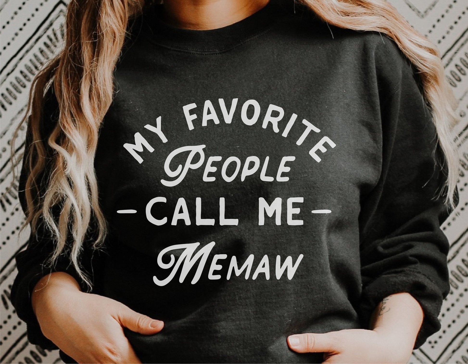 Black sweatshirt with 'My Favorite People Call Me Memaw' text, perfect for Mother's Day gift or digital download for Cricut and Silhouette projects.