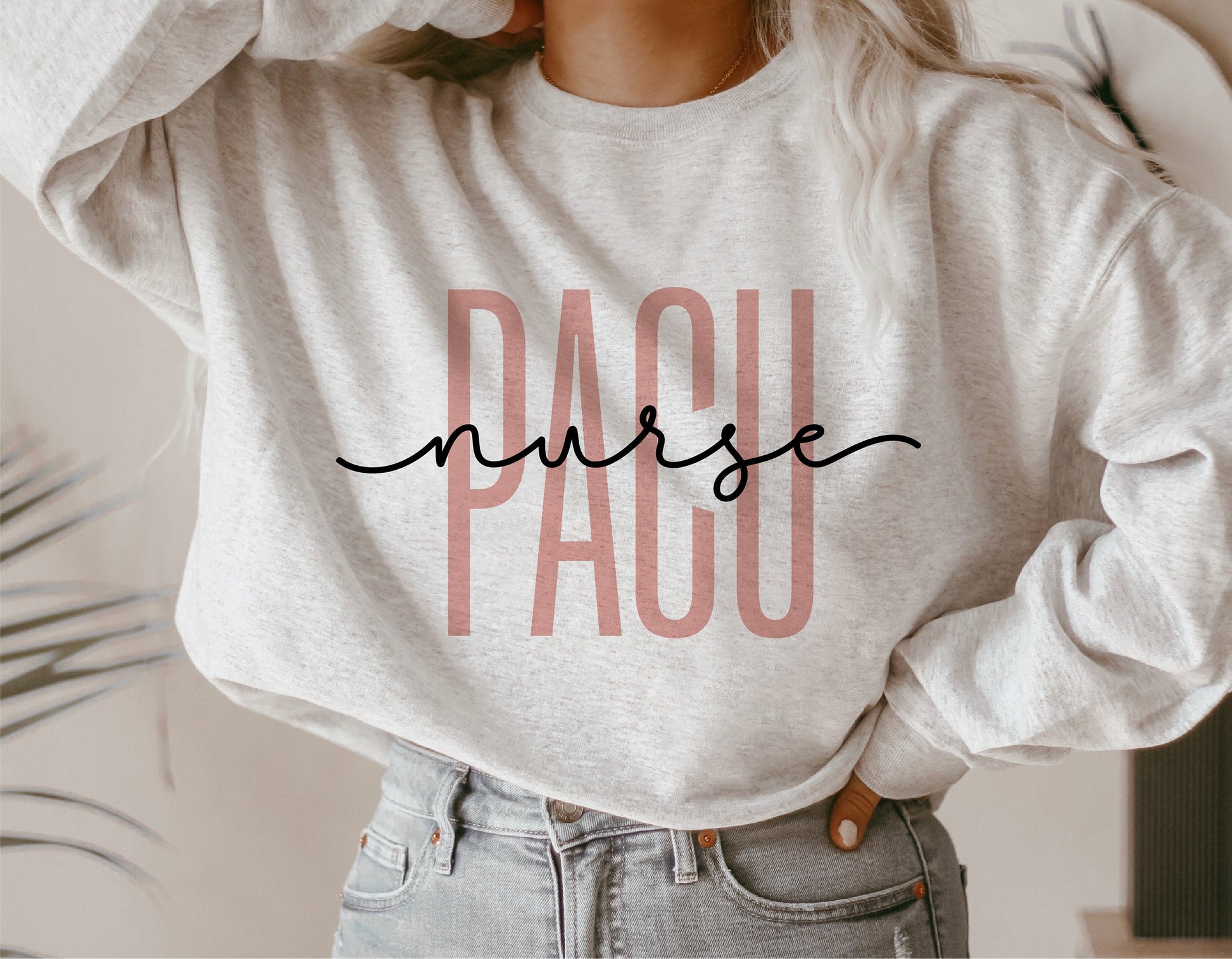 Woman wearing a PACU Nurse shirt, featuring stylish lettering design, ideal for Cricut and Silhouette cutting projects.