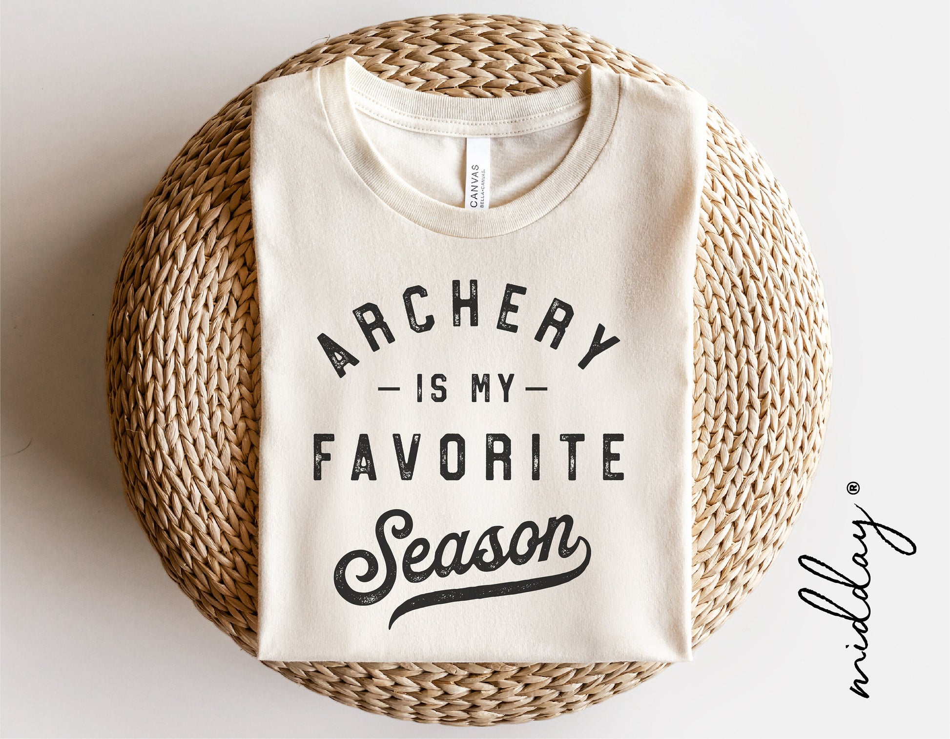 Archery is My Favorite Season shirt displayed on woven mat, perfect for Cricut and Silhouette cutting projects.