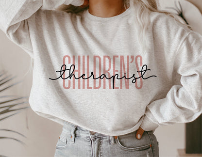 Woman wearing a sweater with 'Children's Therapist' text design, perfect for Cricut and Silhouette cut files.