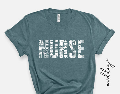 Teal nurse shirt with word art featuring descriptive words like 'honest', 'compassionate', 'optimistic', printed on cotton fabric.