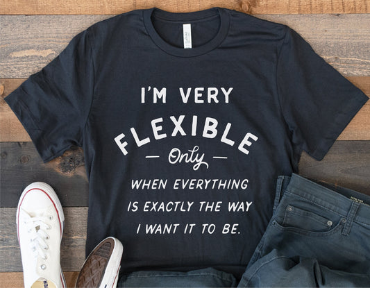 "I'm Very Flexible" funny T-shirt laid out with jeans and sneakers, perfect for mom bosses and sassy personalities.