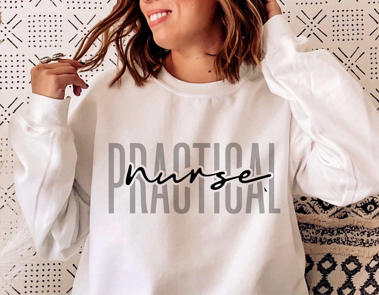 Woman wearing a sweatshirt with 'Practical Nurse' design, ideal for nursing professionals and medical-themed apparel.