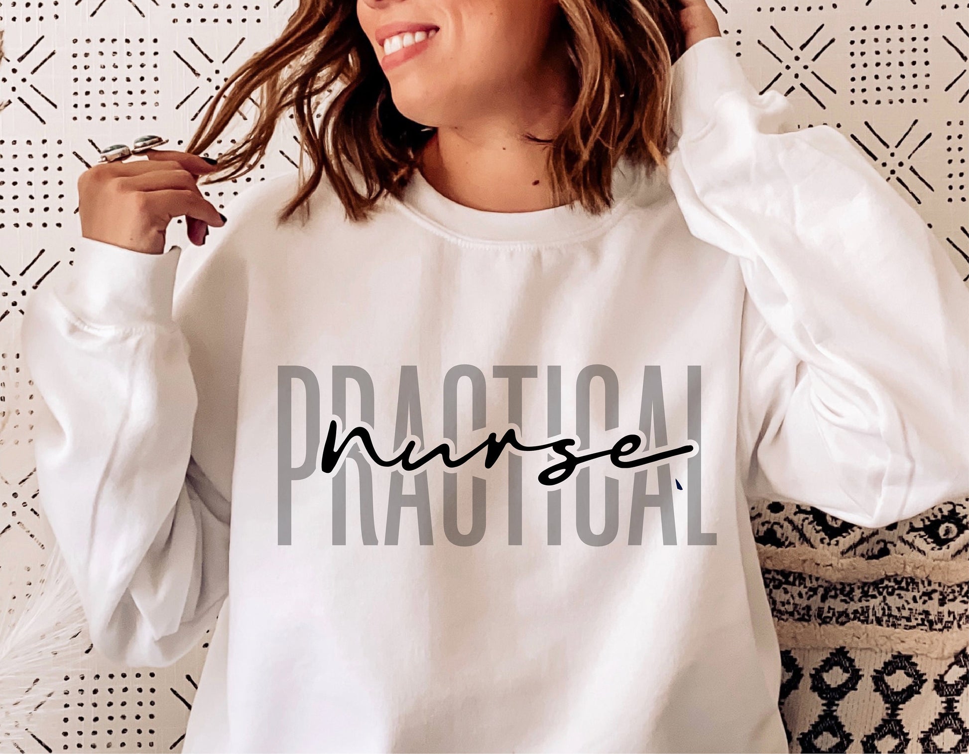 Woman wearing a sweatshirt with 'Practical Nurse' design, ideal for nursing professionals and medical-themed apparel.