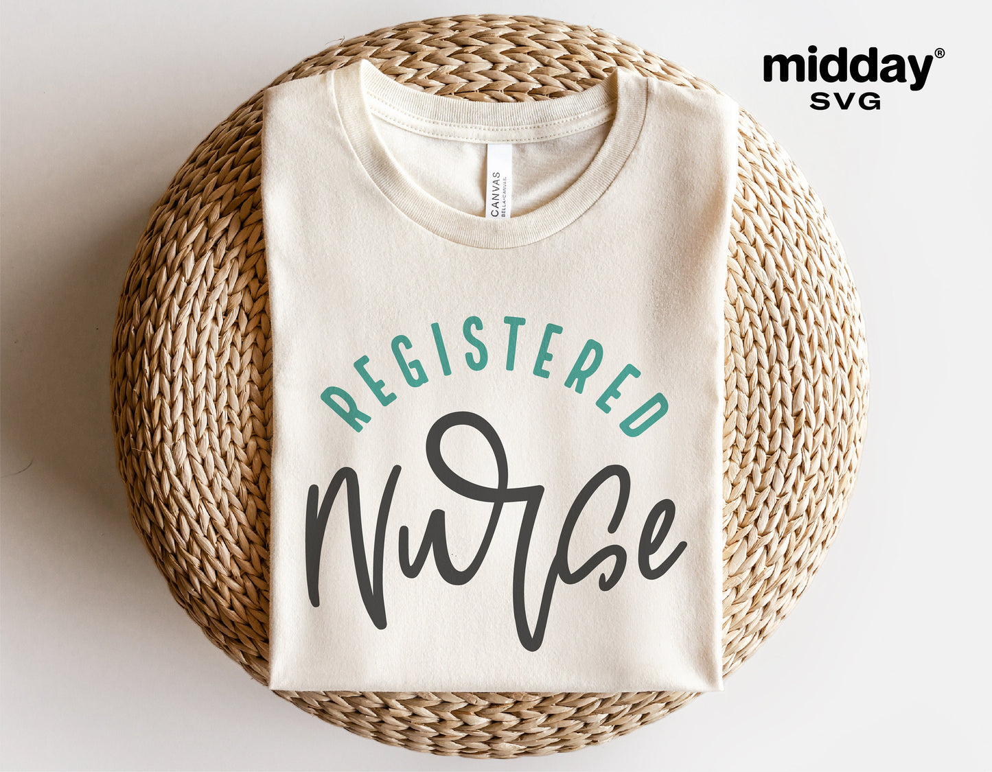 Registered Nurse shirt SVG design with teal and grey text on a folded cream fabric, perfect for Cricut and Silhouette projects.