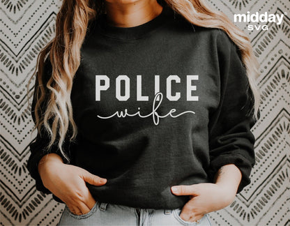 Woman wearing a black 'Police Wife' sweatshirt with stylish lettering, ideal for police family support, available in SVG and PNG cut files.
