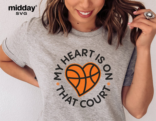 Woman wearing a grey t-shirt with 'My Heart is on That Court' basketball logo, ideal for basketball moms, compatible with Cricut and Silhouette.