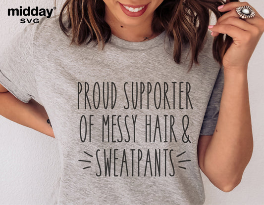 Woman wearing t-shirt with 'Proud Supporter of Messy Hair & Sweatpants' text, showcasing fun SVG cut file design for Cricut and Silhouette.