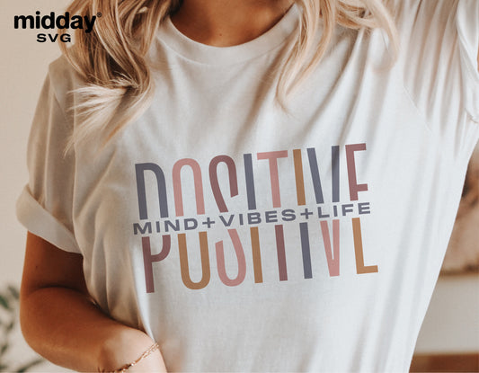 Woman wearing a t-shirt with 'Positive Mind, Vibes, Life' text design, inspirational minimalist SVG perfect for Cricut and Silhouette.