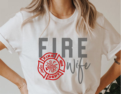 Woman wearing a 'Fire Wife' firefighter shirt with department badge design.