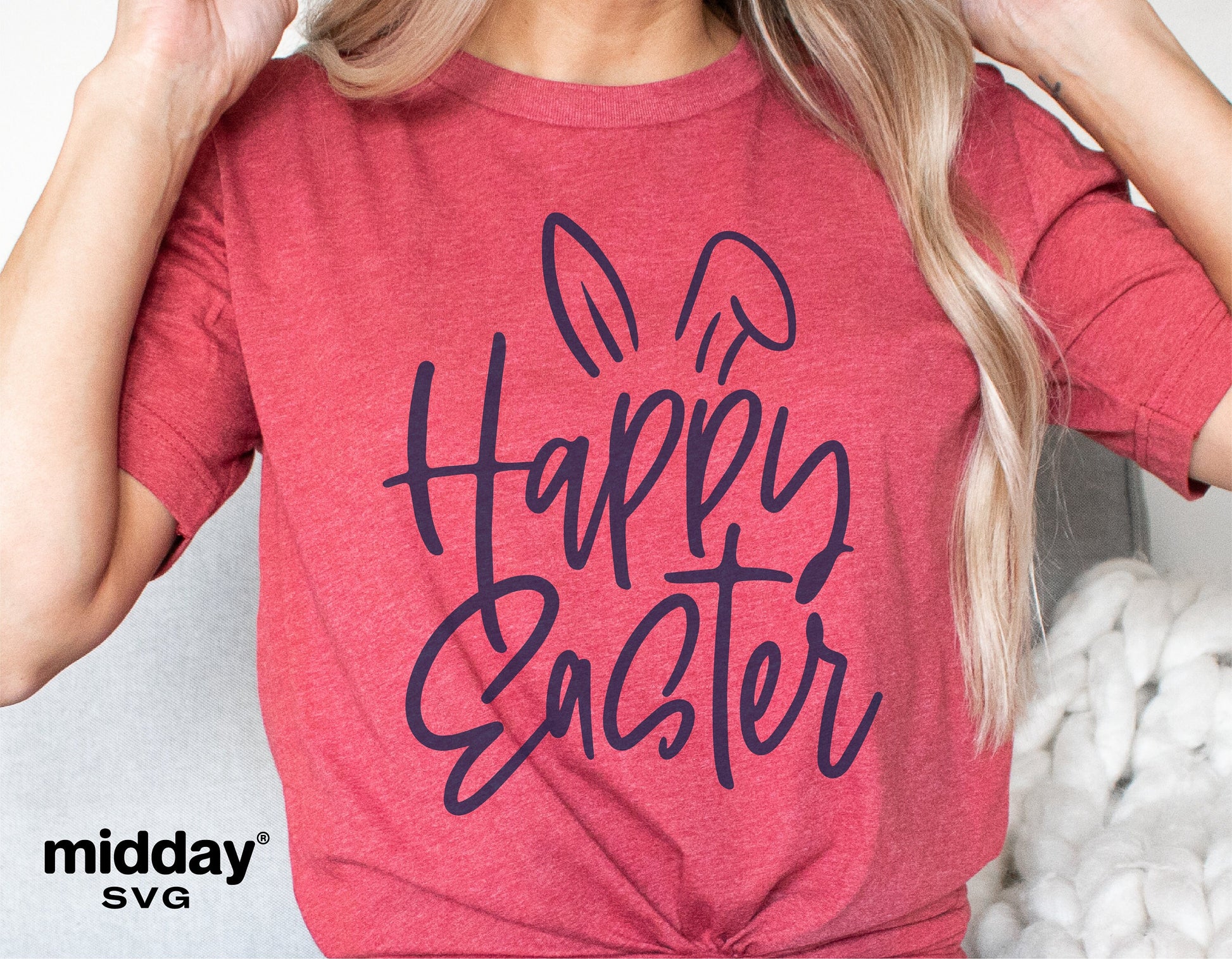 Woman wearing a red shirt with 'Happy Easter' text and bunny ears graphic, showcasing an Easter SVG design for Cricut and Silhouette.