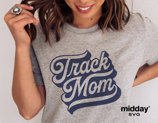Woman wearing gray t-shirt with 'Track Mom' design, perfect for track and field enthusiasts, available for digital download.