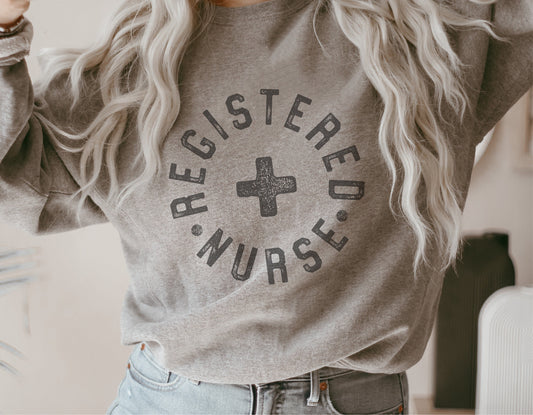Gray sweatshirt with 'Registered Nurse' text and cross design, perfect for male nurses and healthcare professionals, ideal for Cricut projects.