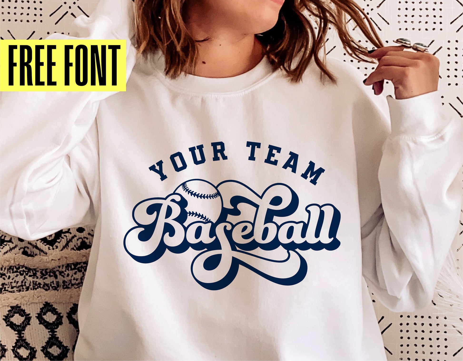 White sweatshirt featuring 'Your Team Baseball' design, ideal for sublimation, Cricut, and Silhouette projects. Free font included.