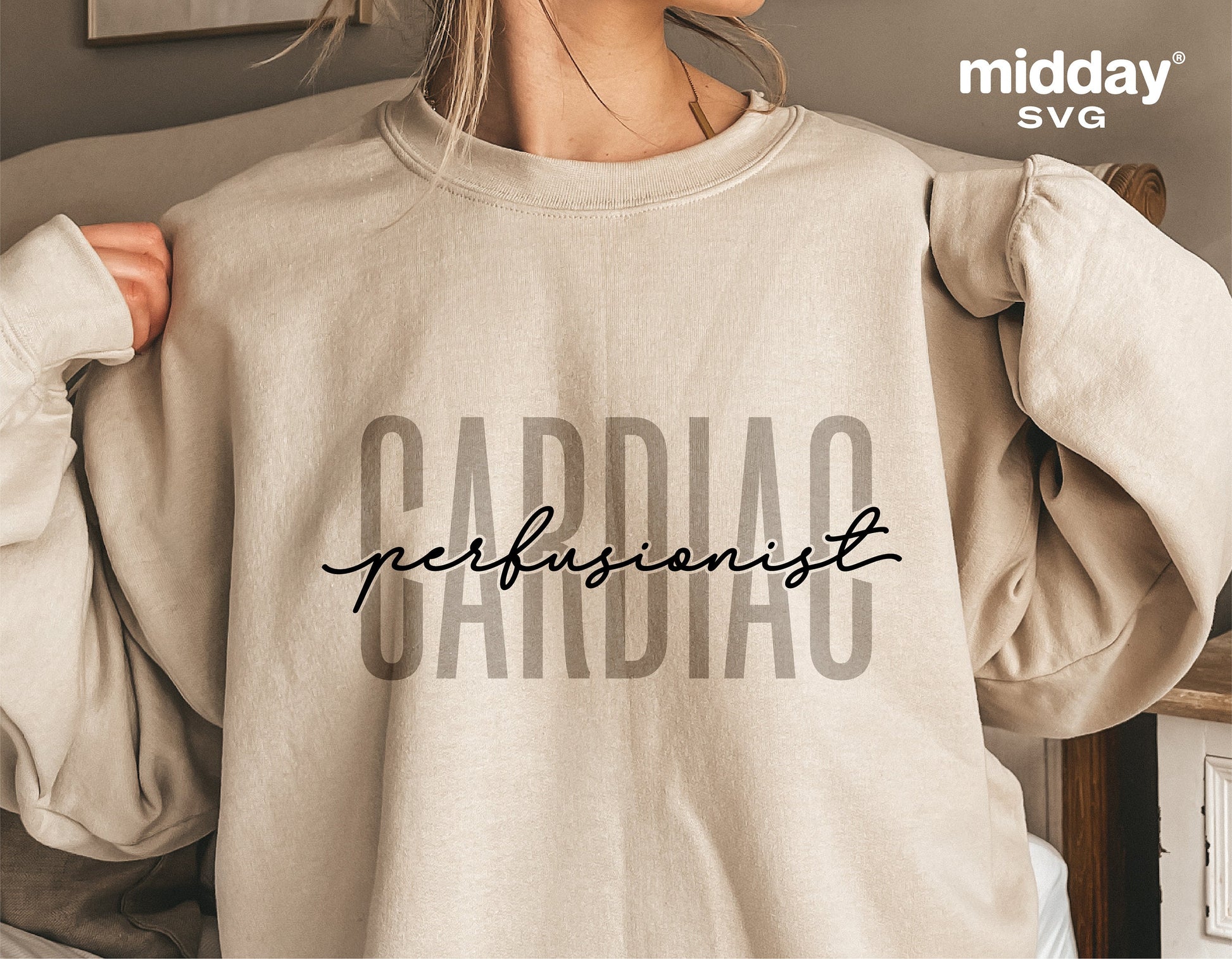 Person wearing a beige sweatshirt with 'Cardiac Perfusionist' text design, suitable for medical professionals and Cricut projects.