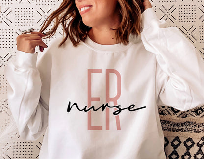 ER nurse sweatshirt with stylish text design worn by a woman.