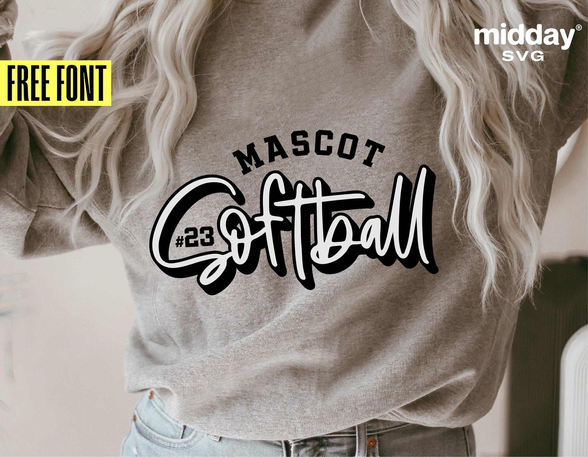 Woman wearing a shirt with Mascot Softball design, DIY template, featuring free font included with the downloads for Cricut use.