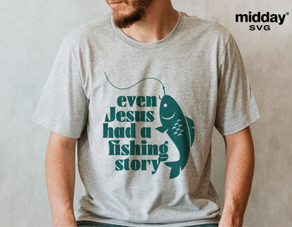 Person wearing t-shirt with 'Even Jesus had a fishing story' design featuring fishing lure graphic.