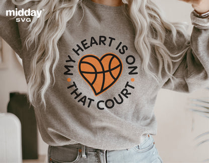 Person wearing a grey sweatshirt with 'My Heart is on That Court' basketball design, suitable for Cricut and Silhouette projects.