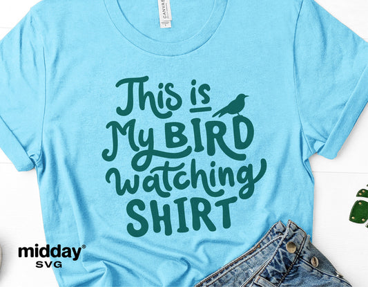 Blue bird watching shirt with text 'This is My Bird Watching Shirt', ideal for bird lovers and spring hobbyists. Includes SVG for Cricut/Silhouette.