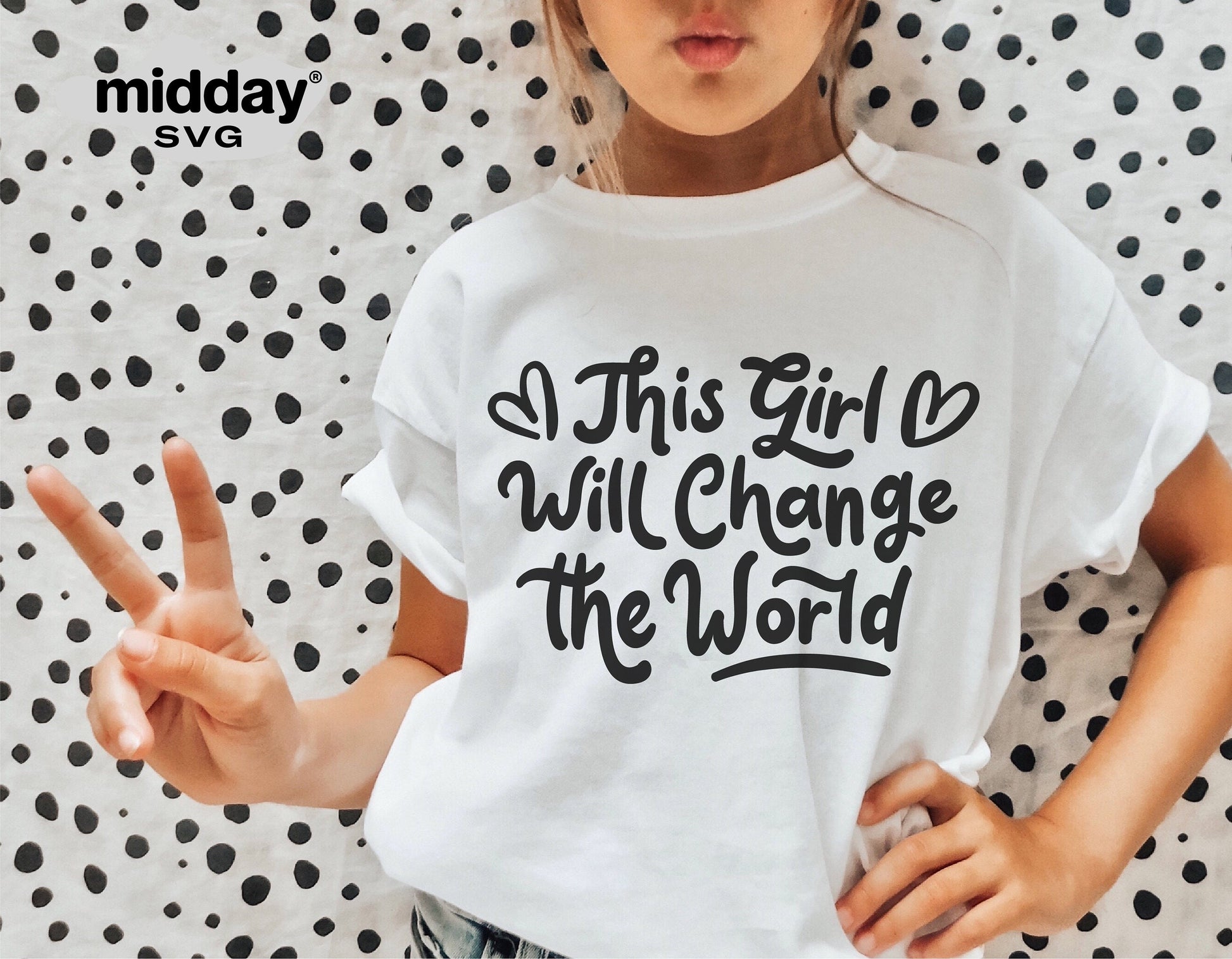 Girl wearing 'This Girl Will Change the World' T-shirt, peace sign, inspirational SVG design for Cricut and Silhouette projects.