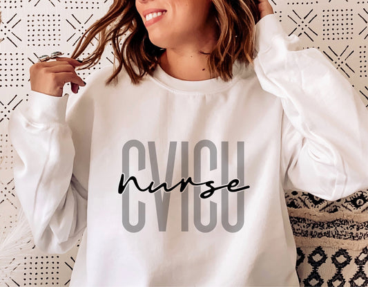 White sweatshirt featuring 'CVICU Nurse' design, worn by a woman, ideal for cardiovascular nurses and nursing students. Cricut cut file suitable.