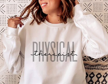 Woman wearing a white sweatshirt with 'Physical Therapist' text, ideal for physical therapy gifts, SVG designs for shirts, mugs, and more.