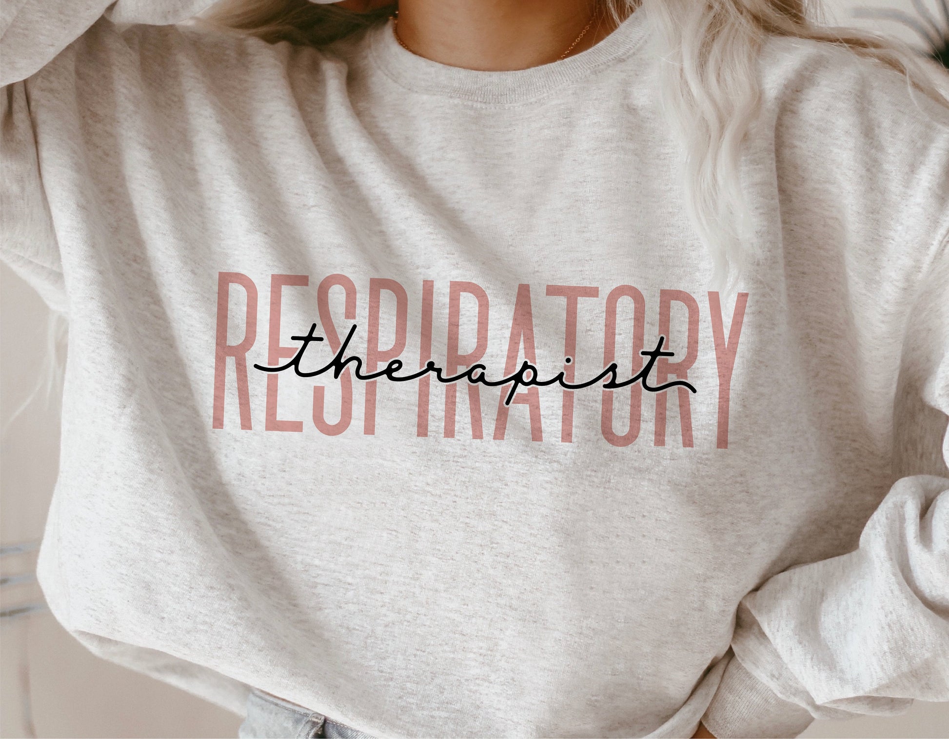 Gray sweatshirt with 'Respiratory Therapist' text design, perfect for healthcare professionals and Cricut crafting projects.