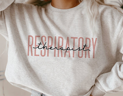 Gray sweatshirt with 'Respiratory Therapist' text design, perfect for healthcare professionals and Cricut crafting projects.