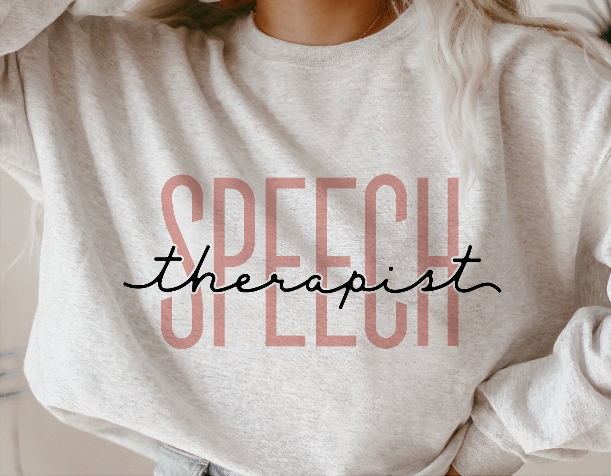 Sweatshirt with 'Speech Therapist' design, ideal for speech therapy professionals and Cricut projects, sublimation, and crafting.