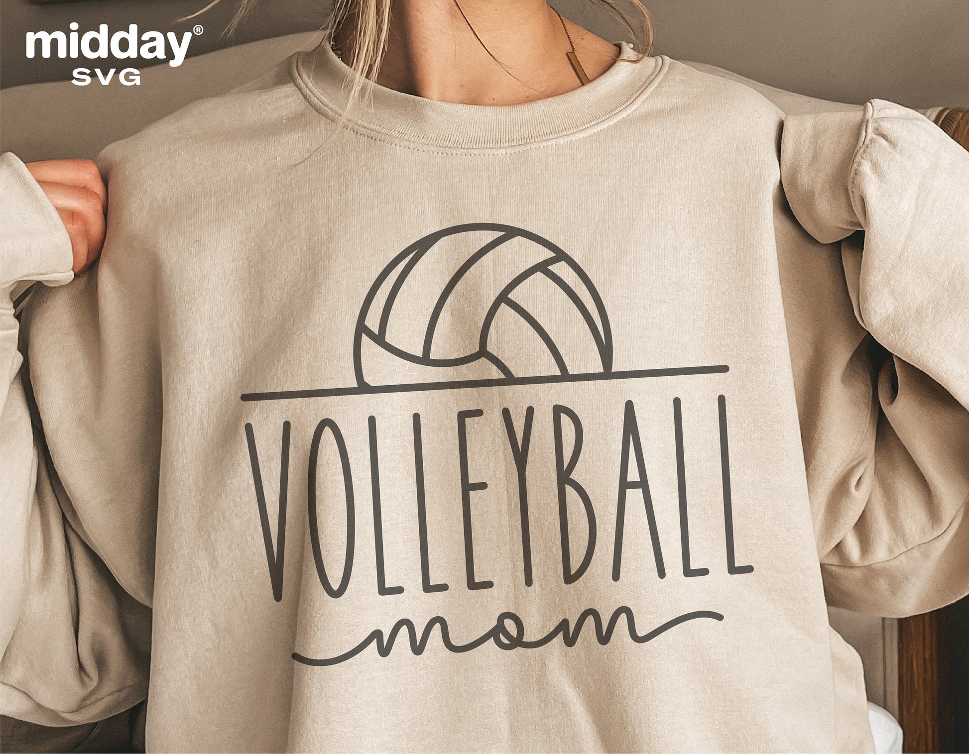 Beige sweatshirt with 'Volleyball Mom' design, perfect for Cricut and Silhouette projects, featuring a volleyball graphic for sports enthusiasts.