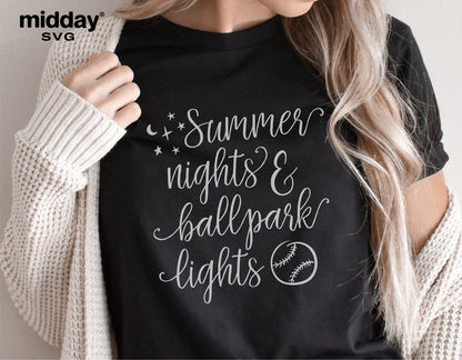 Woman wearing a black t-shirt featuring 'Summer Nights and Ballpark Lights' design, suitable for baseball moms and game day enthusiasts.