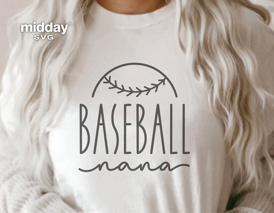 Woman wearing shirt with 'Baseball Nana' design in cursive, featuring a baseball graphic above. Perfect for Cricut and Silhouette projects.
