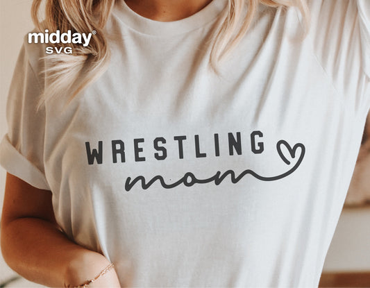 Woman wearing a Wrestling Mom shirt with heart design, perfect for Cricut and Silhouette projects.