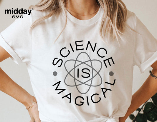 White t-shirt with "Science is Magical" text and atom graphic, designed for Cricut and Silhouette cutting, ideal for science teacher gifts.