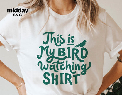 Woman wearing a white t-shirt with 'This is My Bird Watching Shirt' printed in green text, perfect for bird lovers and spring enthusiasts.