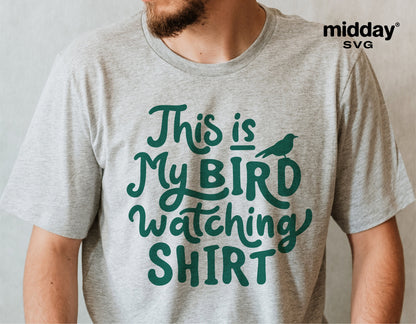 Gray t-shirt with 'This is My Bird Watching Shirt' text design in green, ideal for bird lovers and spring season enthusiasts.